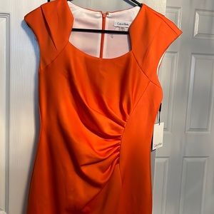Selling this beautiful dress Calvin klein orange size 4 brand new
